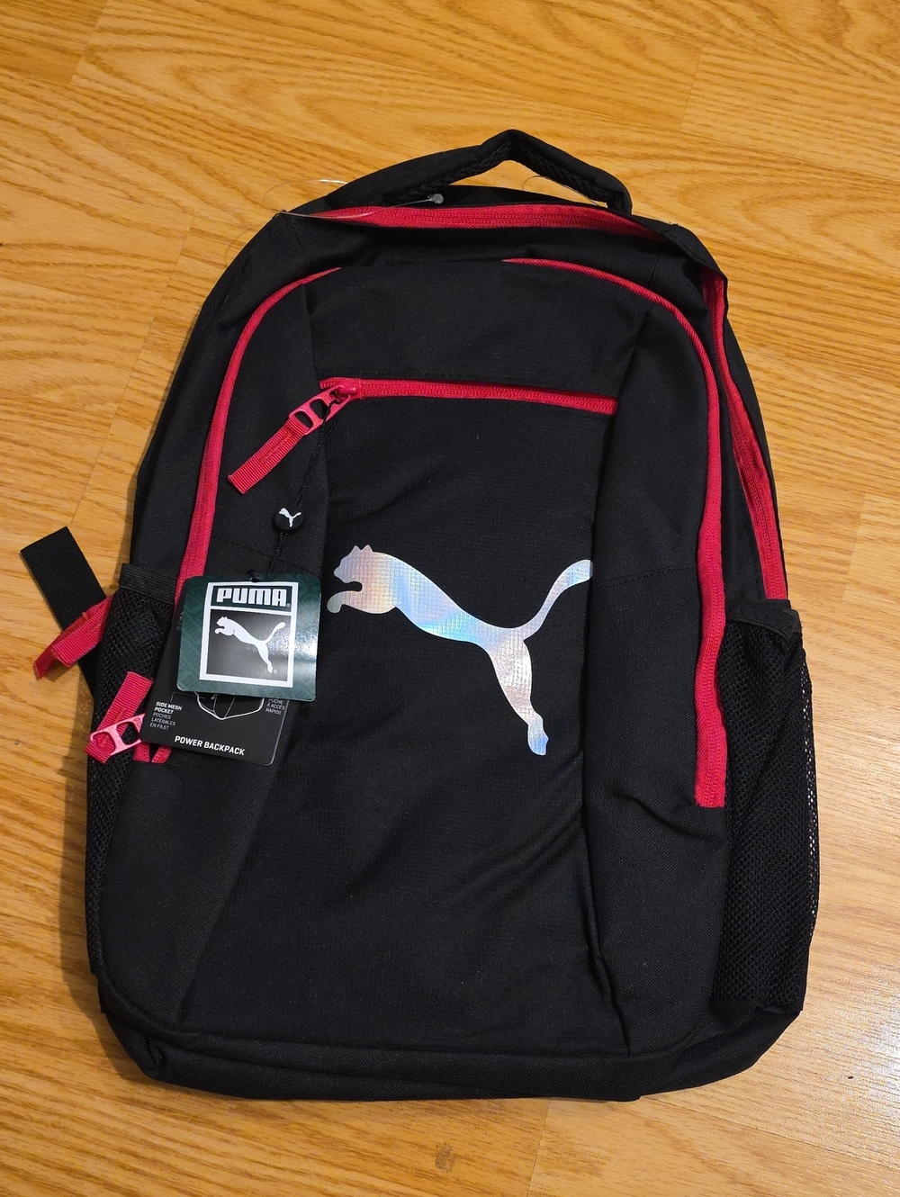 Puma Black Backpack with Pink Accents and Holographic Logo